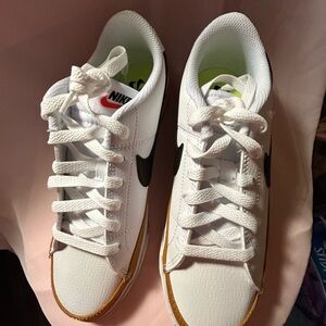 Nike Blazers Ladies White and Black Sneakers with Gold Trim